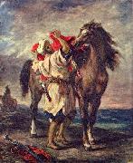Marokkaner beim Satteln seines Pferdes